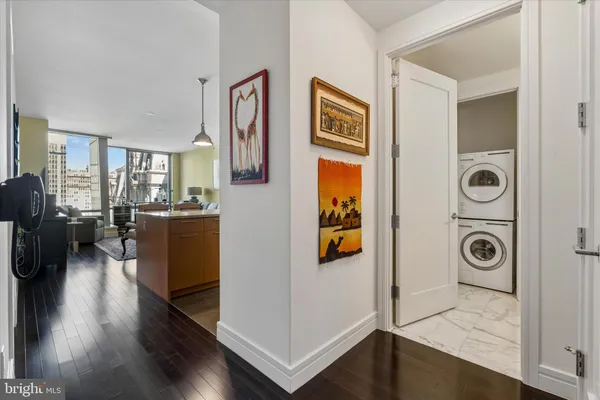 a view of a livingroom with furniture and a gate