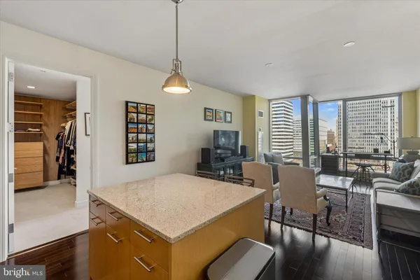 a view of a dining room with furniture and window