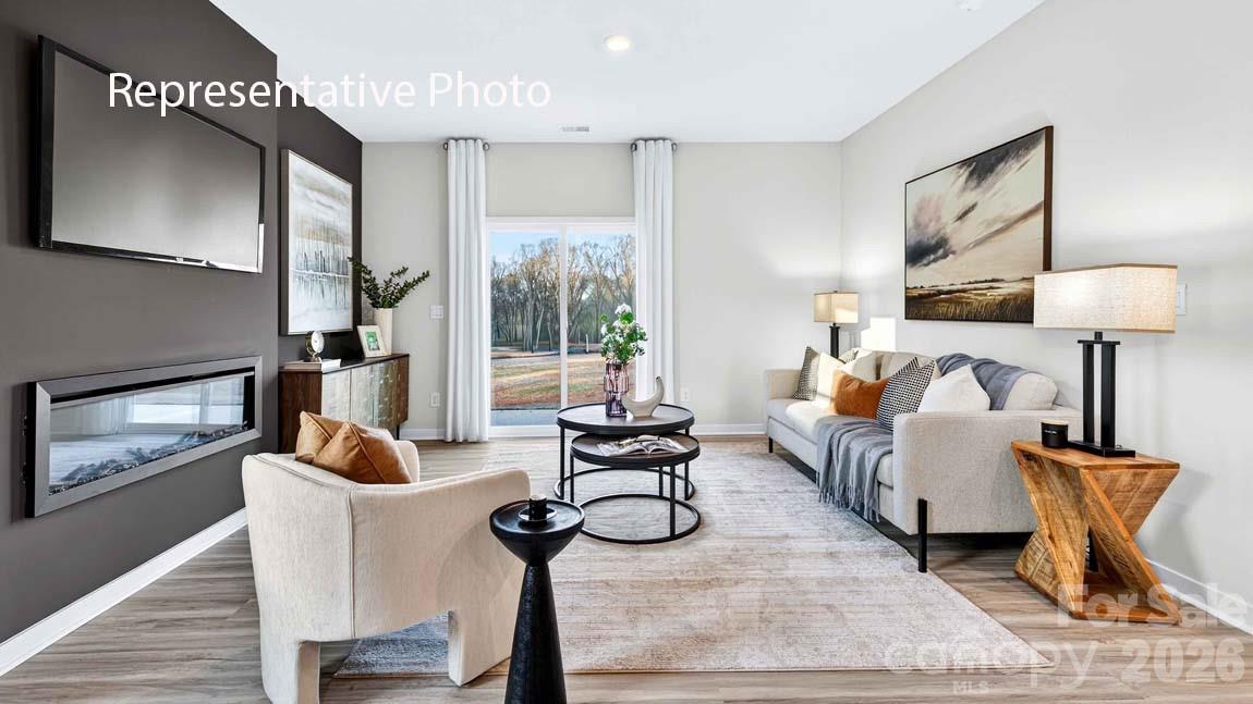1026 Horizon Lane Chester, SC 29706 - Photo 8 of 28 a living room with furniture and a fireplace