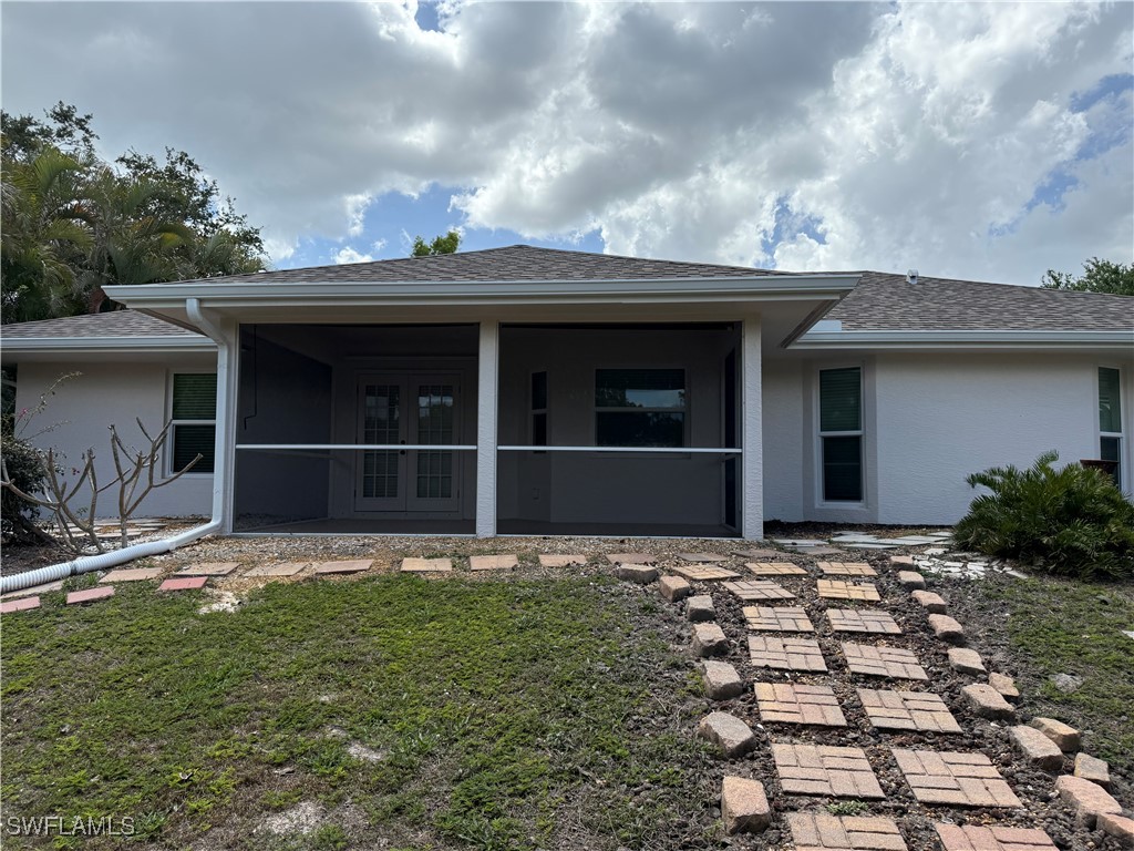 18249 Oak Road Fort Myers, FL 33967 - Photo 4 of 16 a view of front door and yard