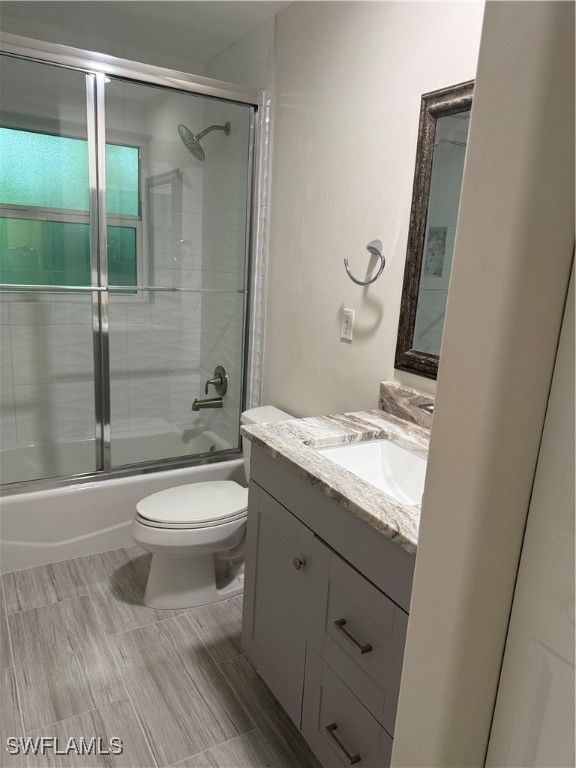18249 Oak Road Fort Myers, FL 33967 - Photo 10 of 16 a bathroom with a sink a toilet and shower