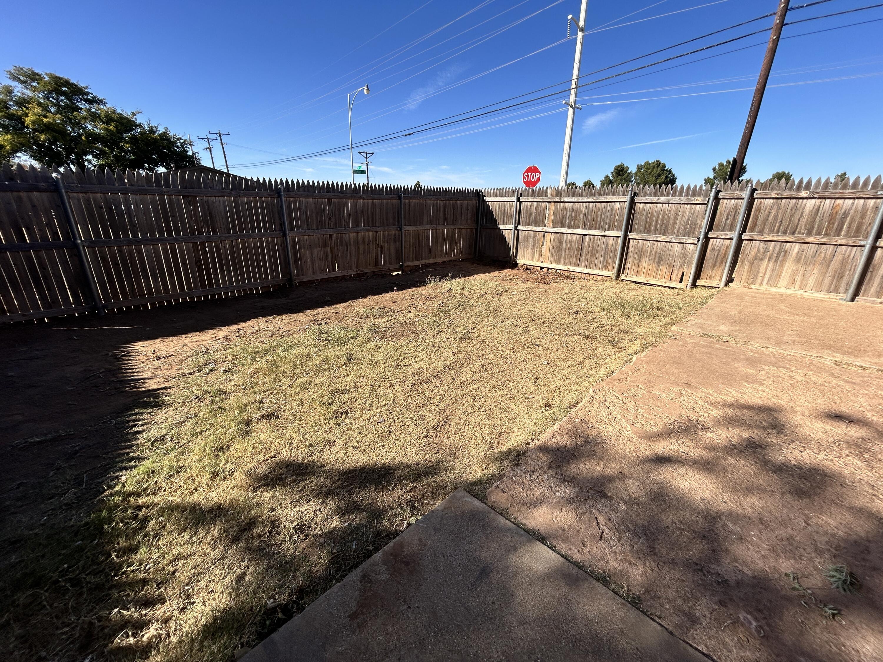 5533 34th Street, Unit A Lubbock, TX 79407 - Photo 12 of 12 a view of a backyard