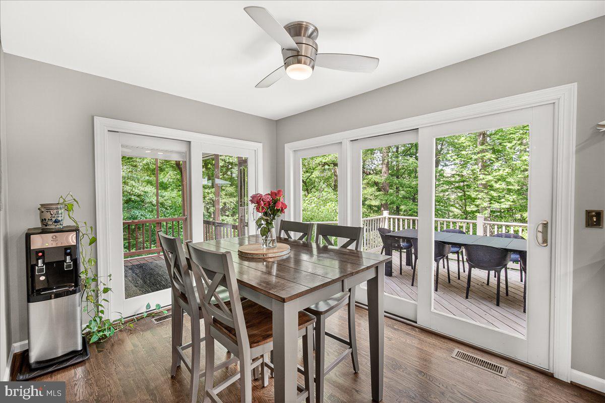 10490 Lakeridge Court New Market, MD 21774 - Photo 21 of 79 a view of a dining room with furniture window and outside view
