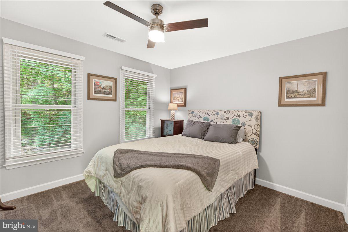 10490 Lakeridge Court New Market, MD 21774 - Photo 27 of 79 a bedroom with a bed and a window