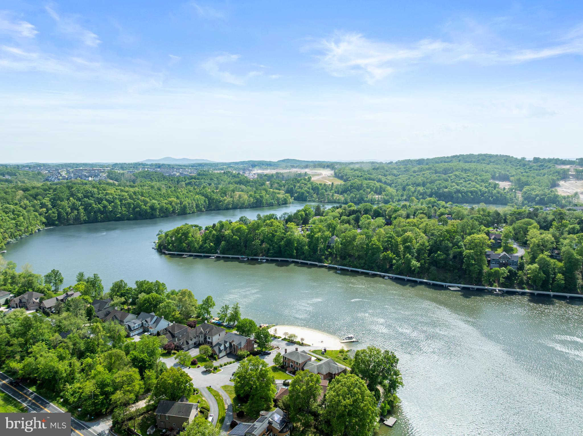 10490 Lakeridge Court New Market, MD 21774 - Photo 61 of 79 a view of a lake with a city