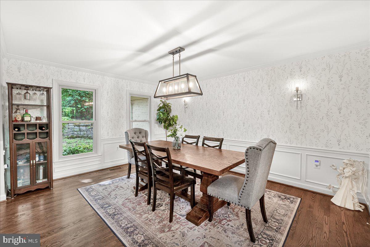 10490 Lakeridge Court New Market, MD 21774 - Photo 10 of 79 a view of a dining room with furniture window and wooden floor