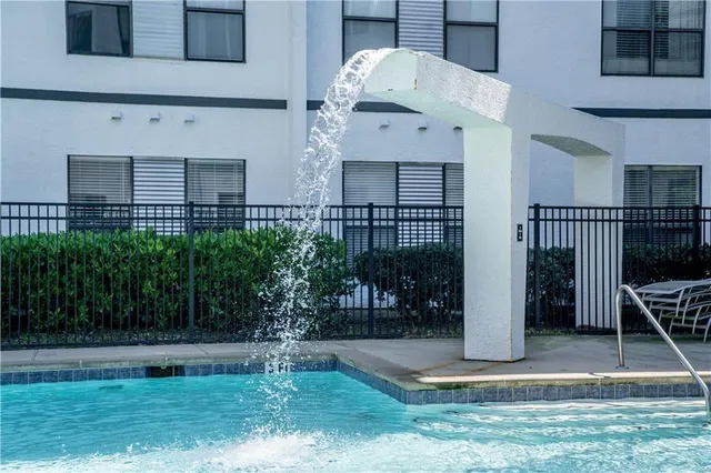 a aerial view of a house with a yard