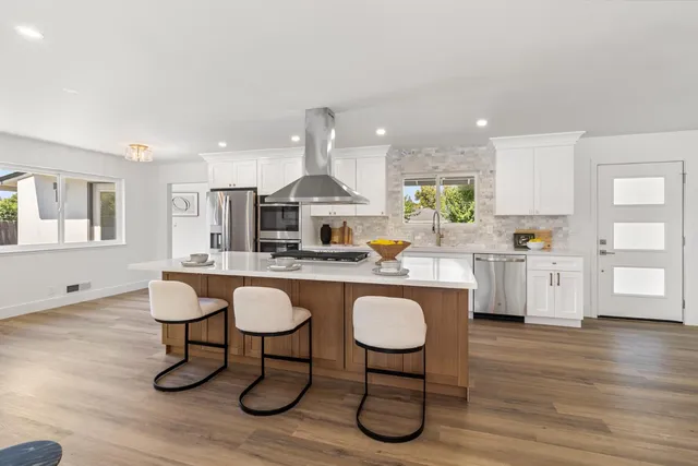 a bathroom with a toilet a sink and a mirror
