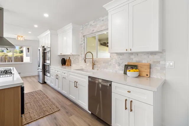 a view of a workspace with furniture