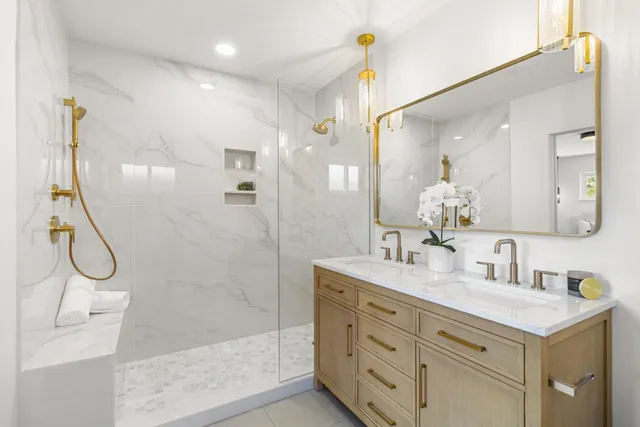 a view of a patio with a table chairs and a potted plants