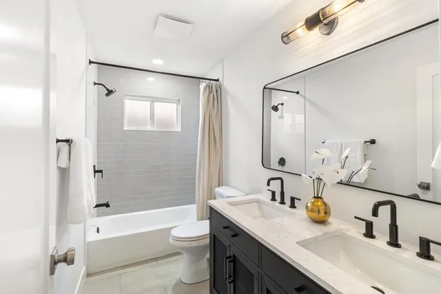 a view of a road with a building in the background