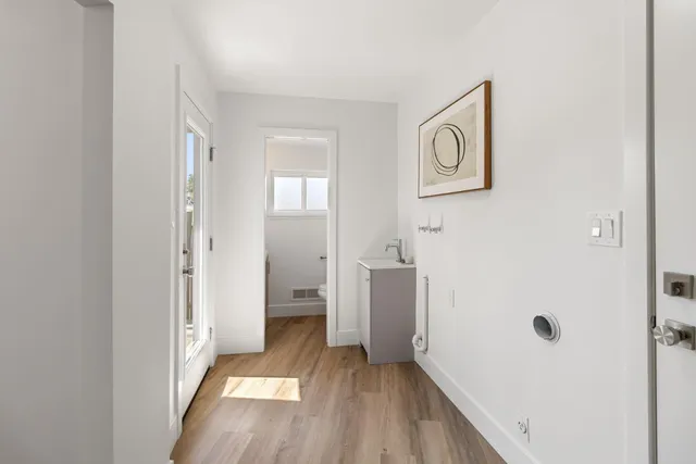 an aerial view of a city and lake view