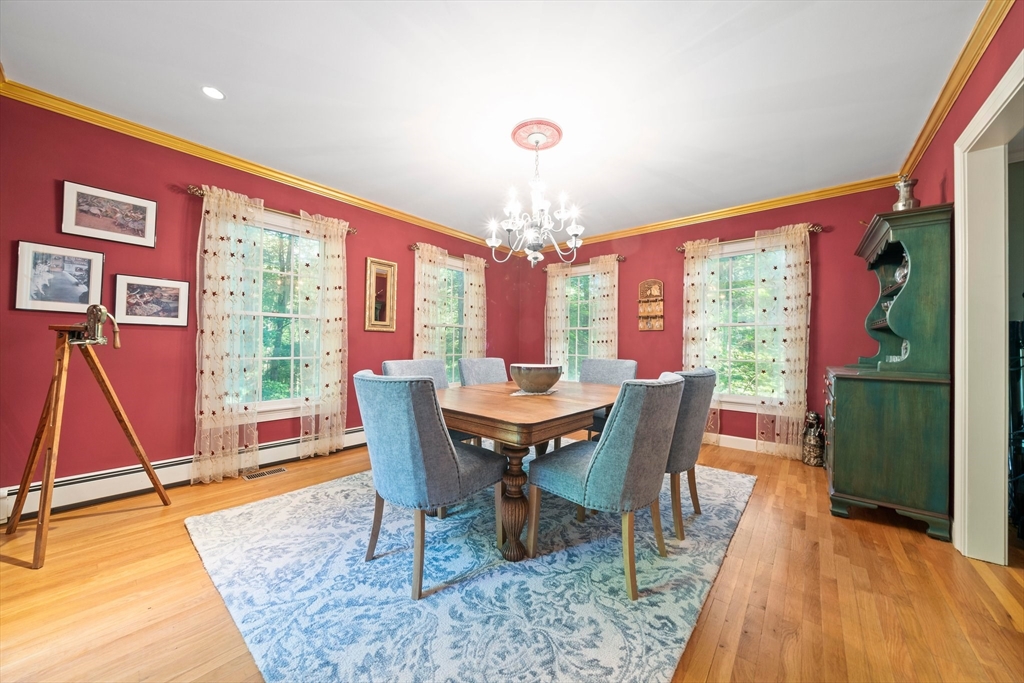155 Pine Street Medfield, MA 02052 - Photo 12 of 40 a view of a dining room with furniture window and wooden floor