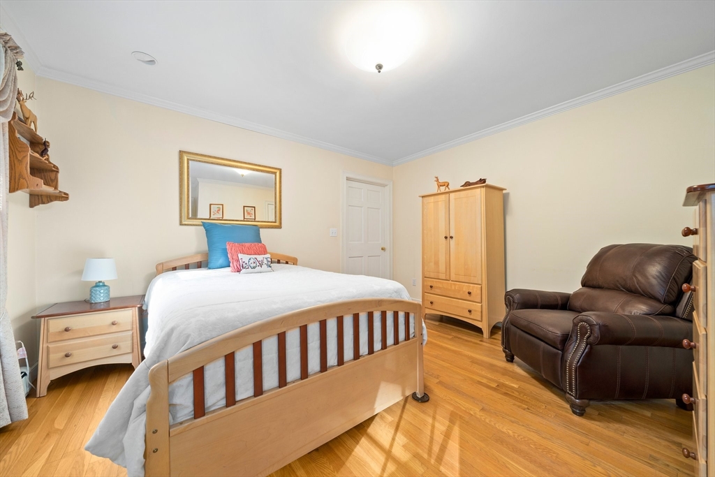 155 Pine Street Medfield, MA 02052 - Photo 16 of 40 a bedroom with a bed and a couch