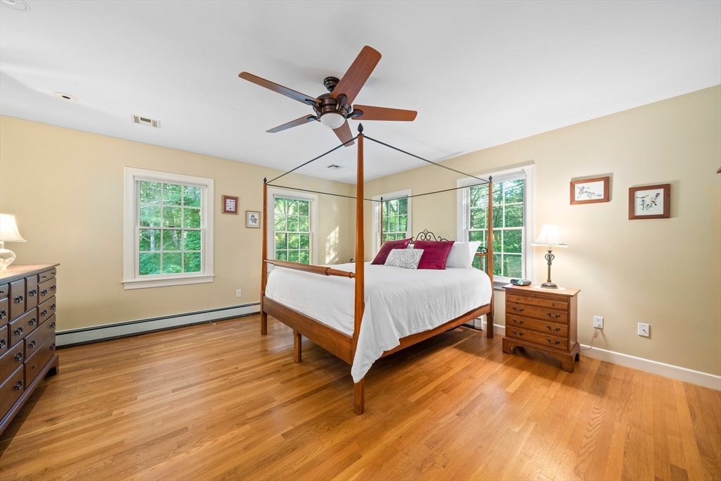 155 Pine Street Medfield, MA 02052 - Photo 17 of 40 a bedroom with a bed and a window