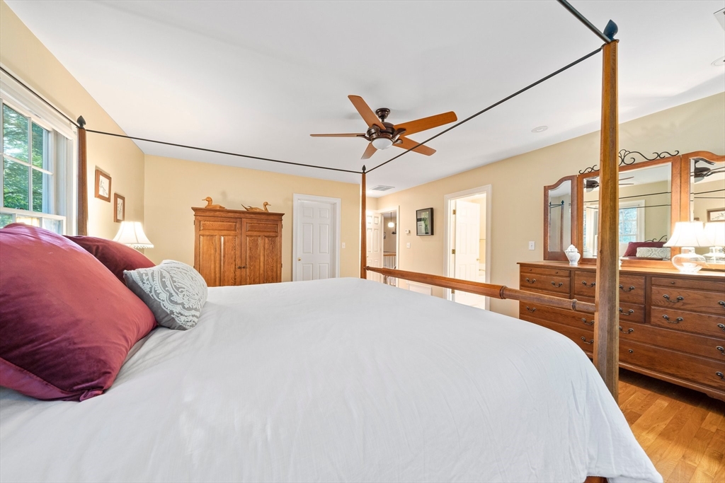 155 Pine Street Medfield, MA 02052 - Photo 18 of 40 a bedroom with a bed and a dresser