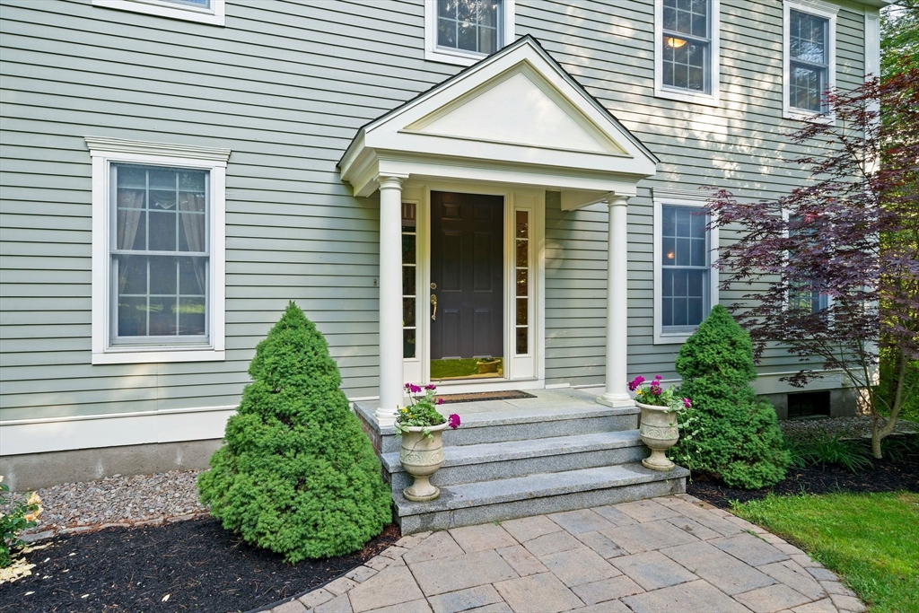 155 Pine Street Medfield, MA 02052 - Photo 2 of 40 a front view of a house with garden