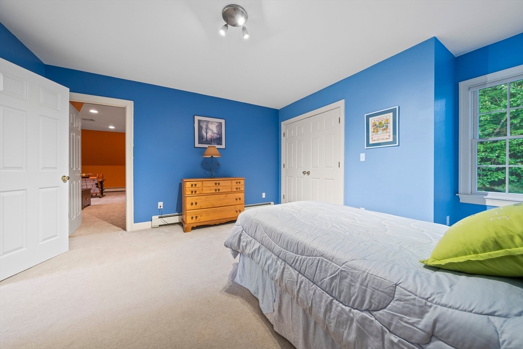 155 Pine Street Medfield, MA 02052 - Photo 21 of 40 a bedroom with a bed and window