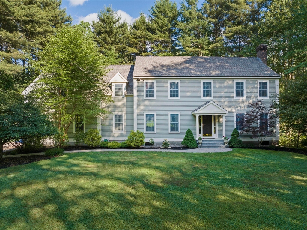 155 Pine Street Medfield, MA 02052 - Photo 3 of 40 a front view of a house with a garden