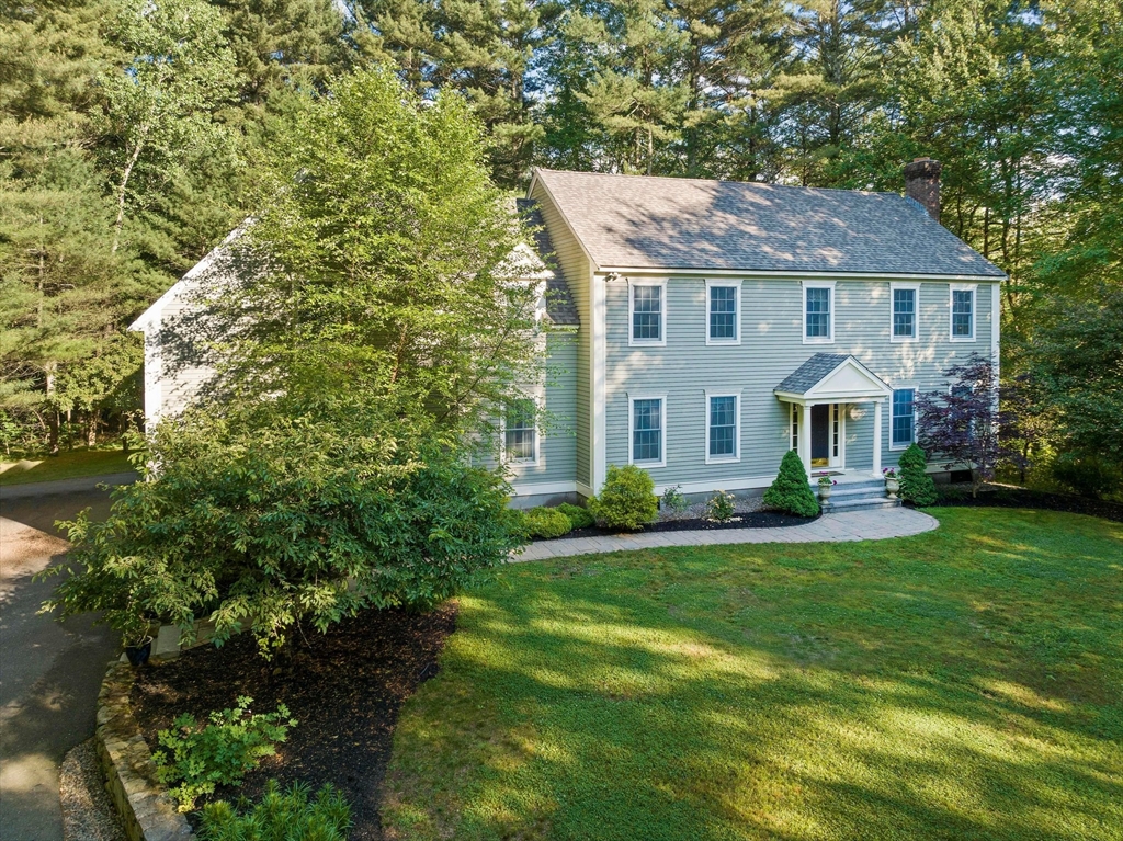 155 Pine Street Medfield, MA 02052 - Photo 4 of 40 a front view of a house with a yard and trees