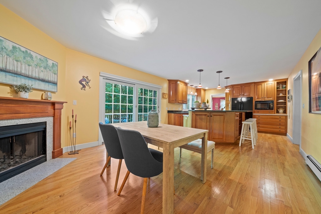 155 Pine Street Medfield, MA 02052 - Photo 10 of 40 a view of a dining room with furniture window and wooden floor