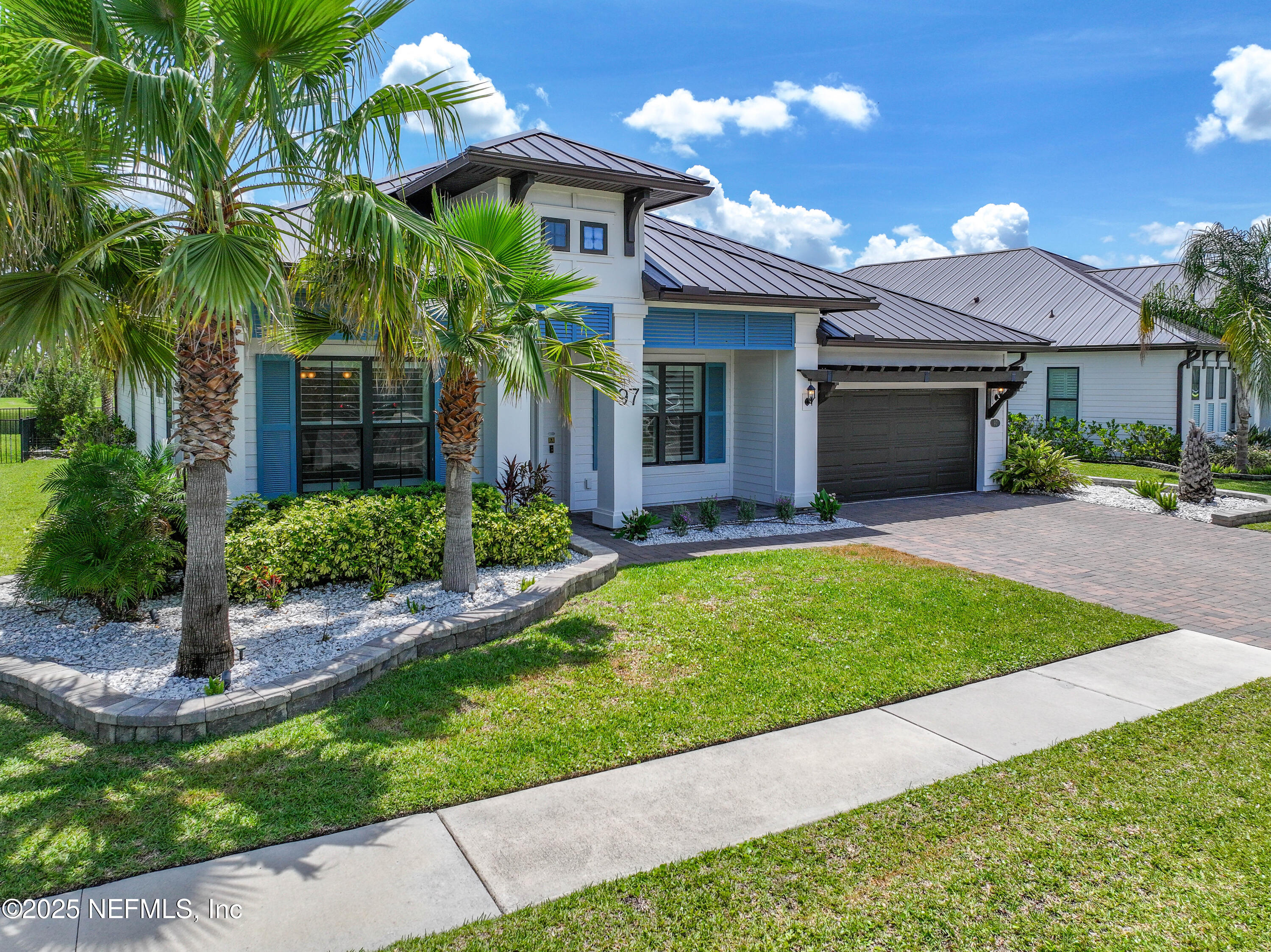 97 Marquesa Circle St. Johns, FL 32259 - Photo 2 of 86 a front view of a house with a garden and yard