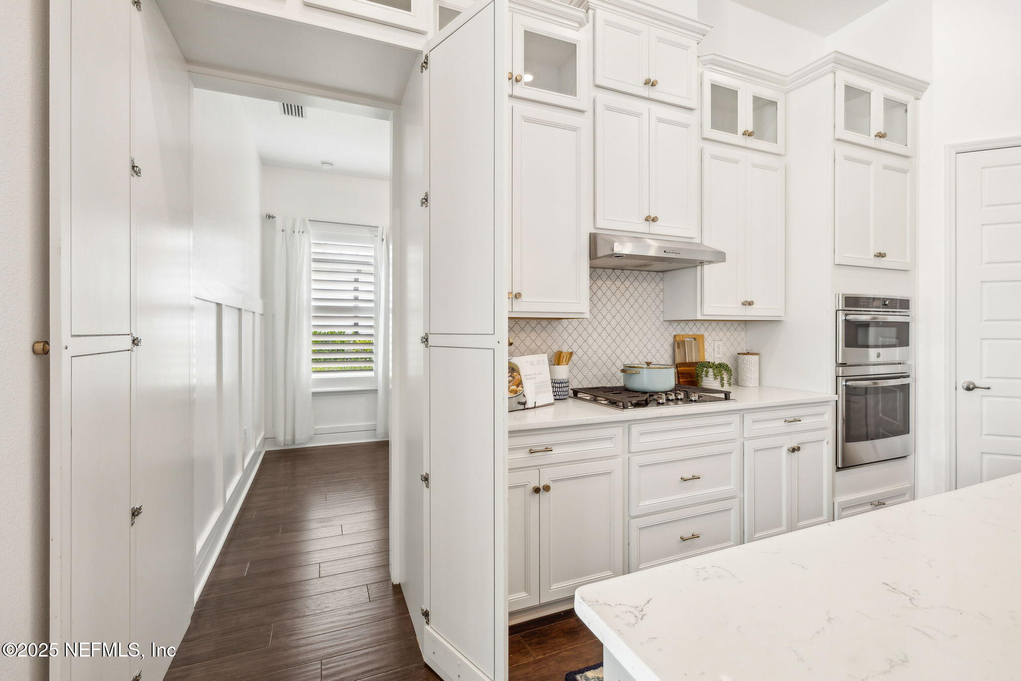 97 Marquesa Circle St. Johns, FL 32259 - Photo 22 of 86 a kitchen with stainless steel appliances a stove refrigerator and cabinets