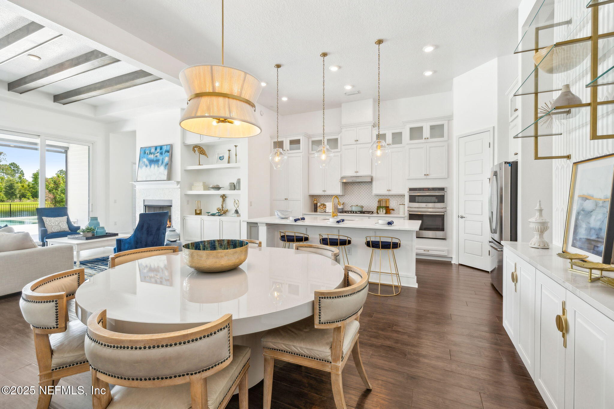 97 Marquesa Circle St. Johns, FL 32259 - Photo 24 of 86 a kitchen with a table chairs stove and kitchen view