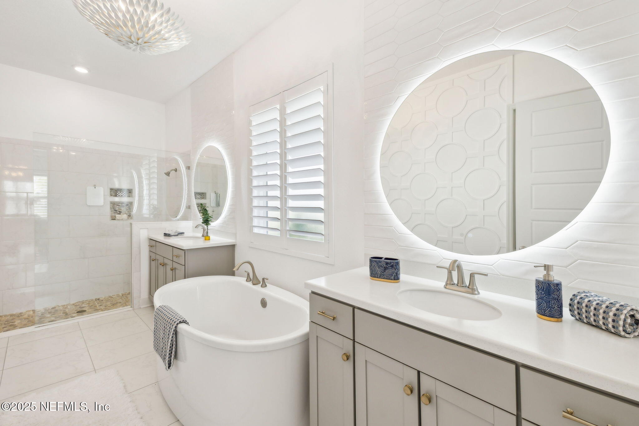 97 Marquesa Circle St. Johns, FL 32259 - Photo 27 of 86 a bathroom with a sink and a mirror