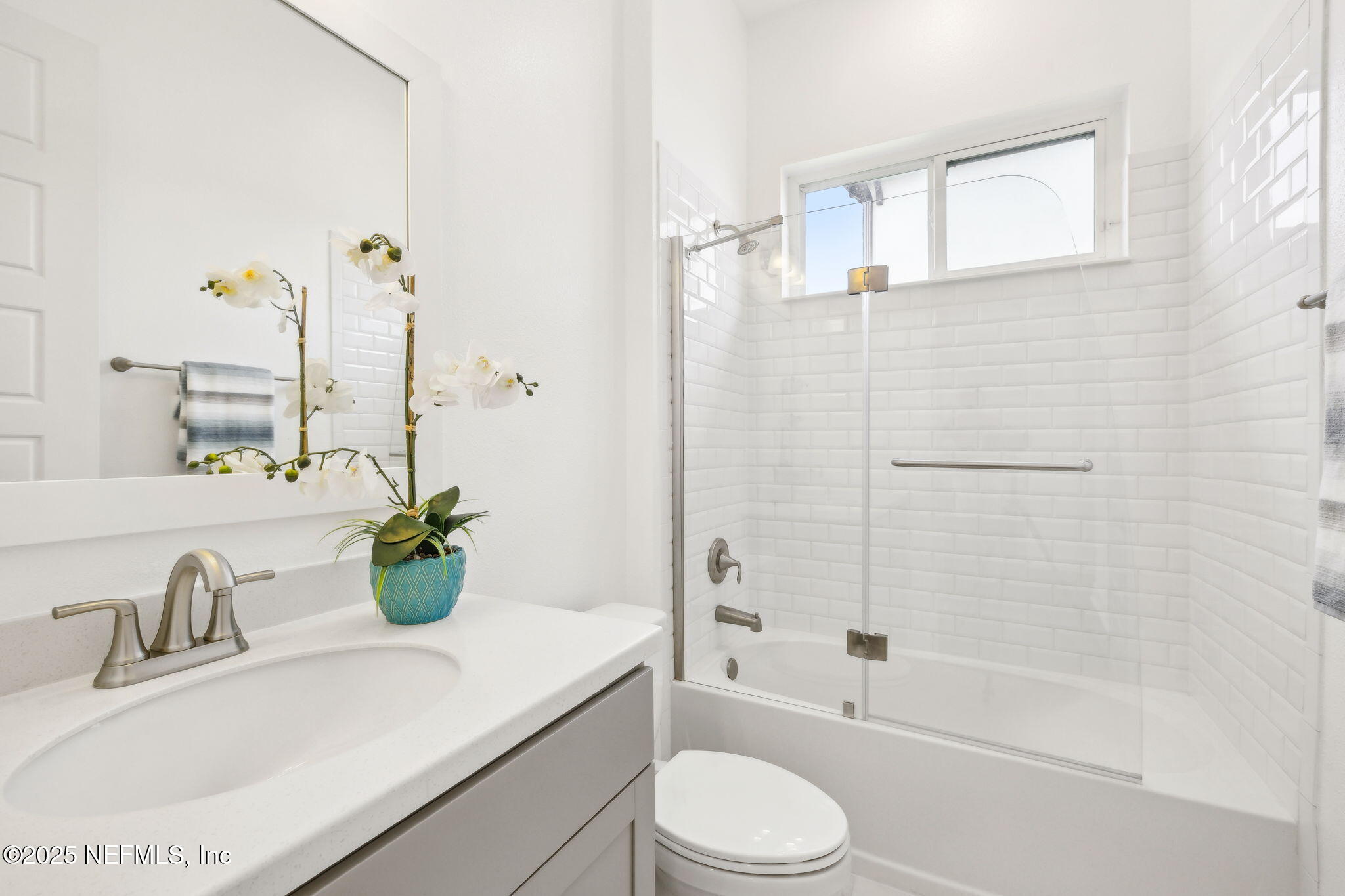 97 Marquesa Circle St. Johns, FL 32259 - Photo 33 of 86 a bathroom with a granite countertop sink a toilet and shower