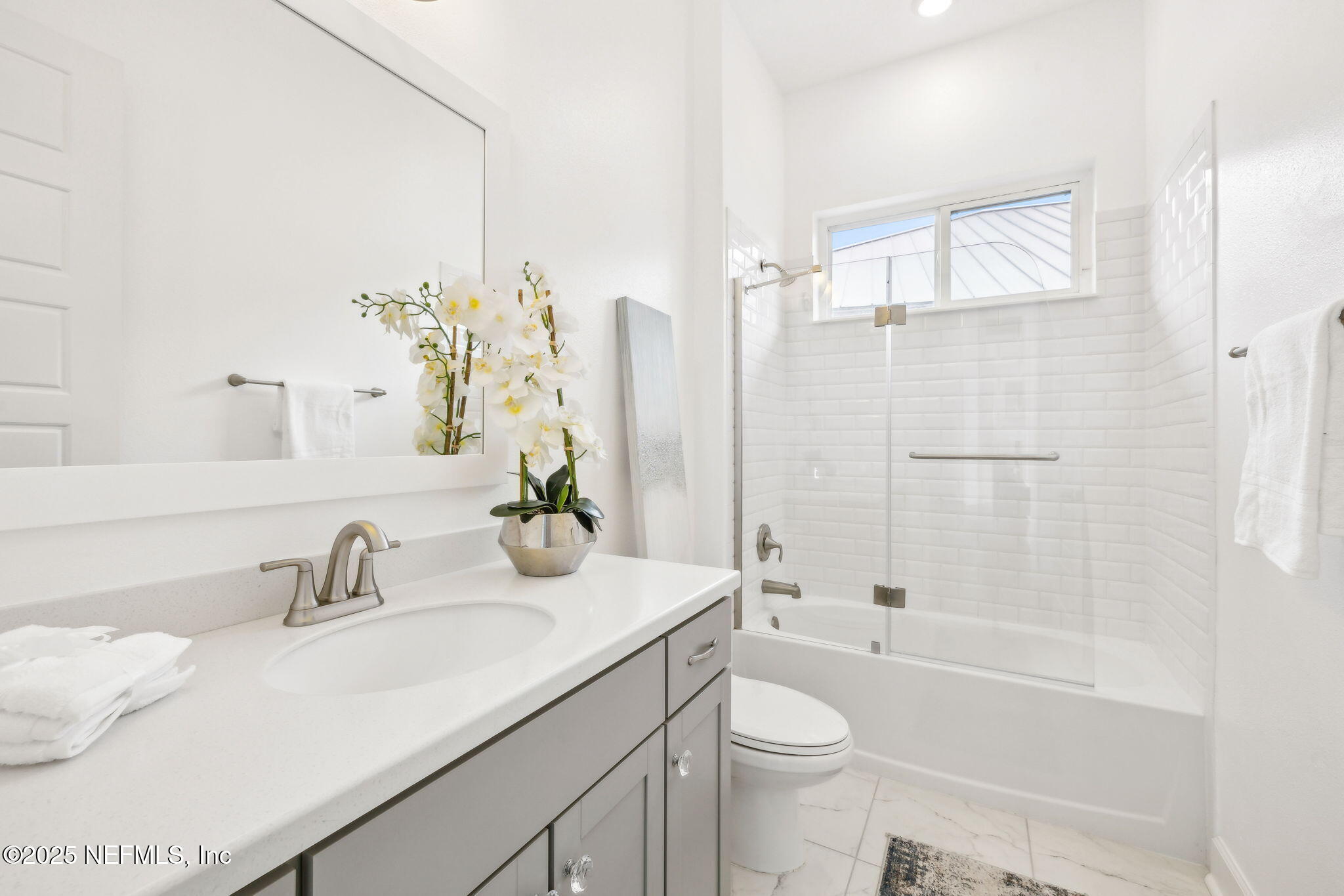 97 Marquesa Circle St. Johns, FL 32259 - Photo 37 of 86 a bathroom with a sink a toilet and shower