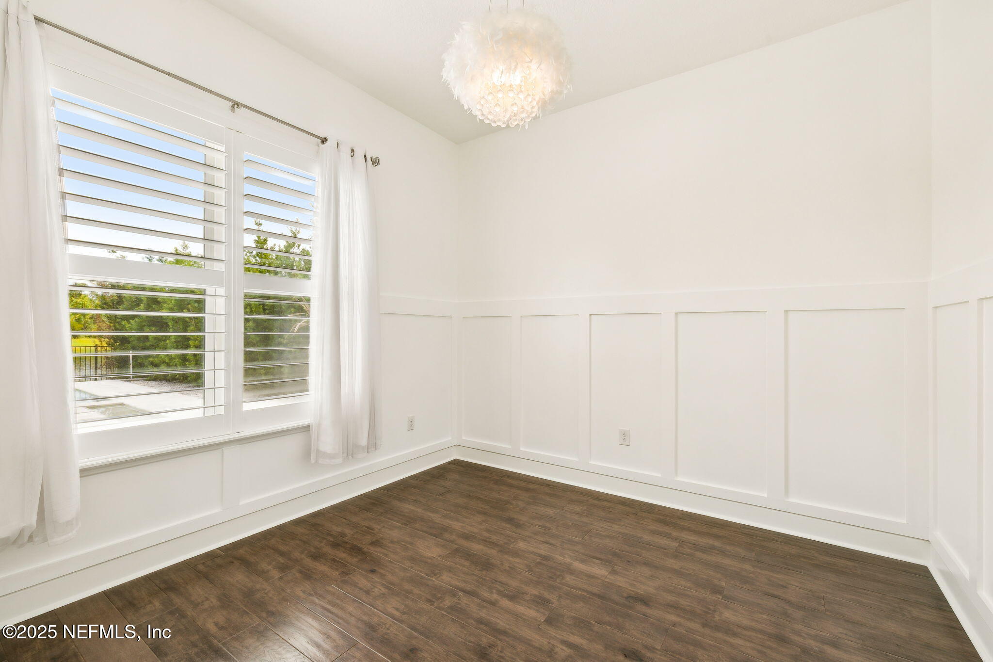 97 Marquesa Circle St. Johns, FL 32259 - Photo 38 of 86 wooden floor in an empty room with a window
