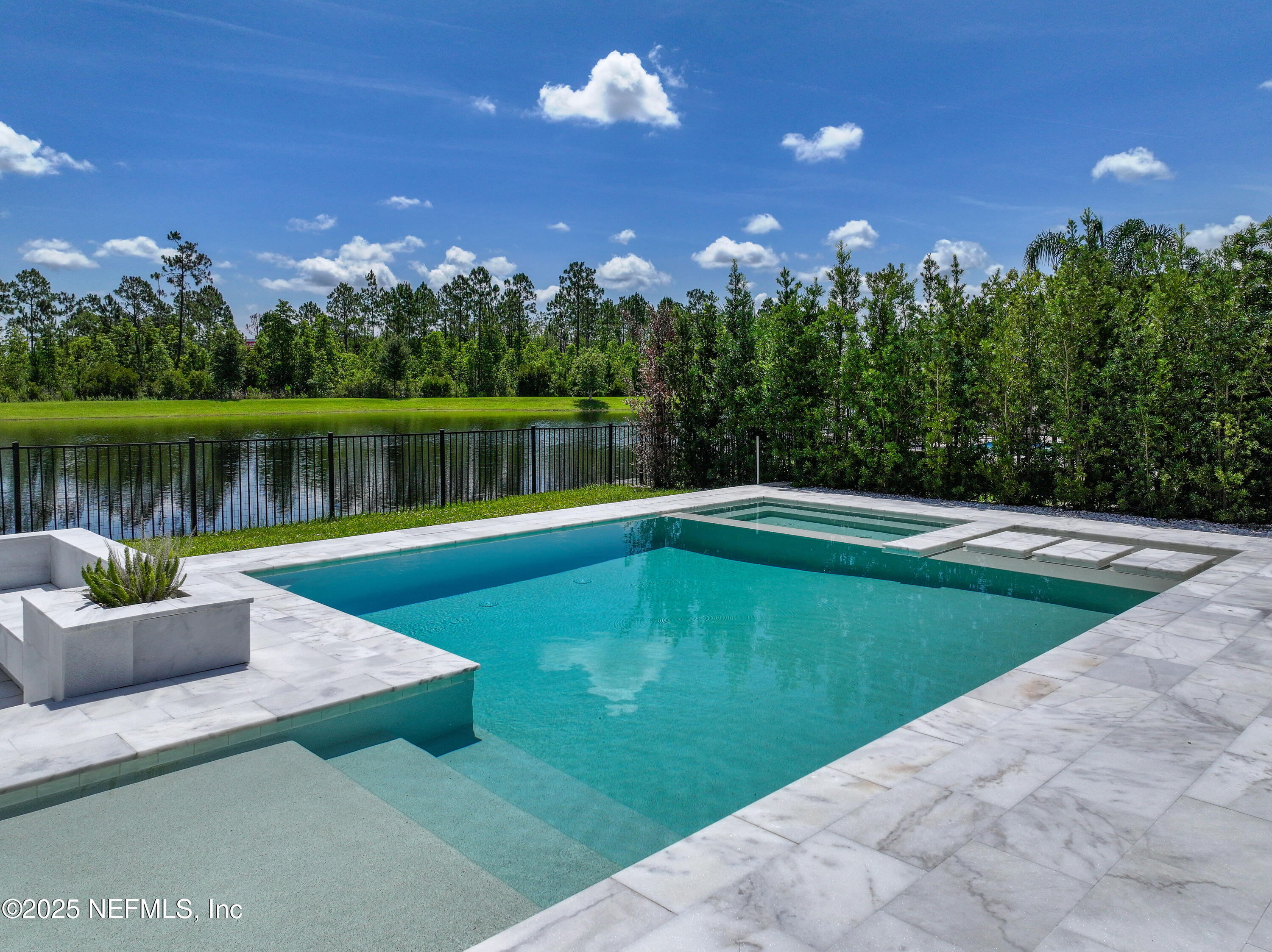 97 Marquesa Circle St. Johns, FL 32259 - Photo 4 of 86 a view of a lake with a yard