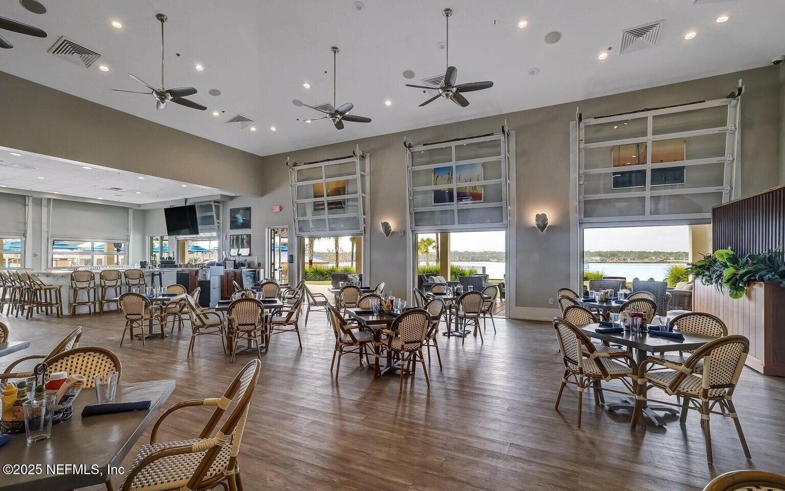 97 Marquesa Circle St. Johns, FL 32259 - Photo 62 of 86 a view of a dining room with furniture window and wooden floor