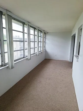 a view of a livingroom with an empty space