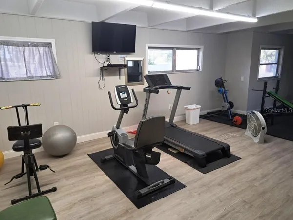 a view of a room with gym equipment