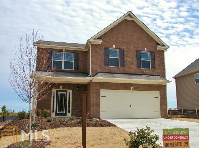 3720 Ridge Bluff, Unit 224 Gainesville, GA 30507 - Photo 1 of 1 a front view of a house with garage