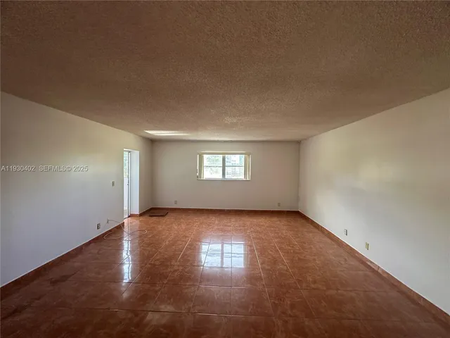 an empty room with window