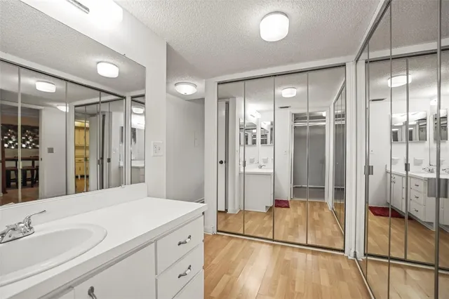 a spacious bathroom with a shower and a sink