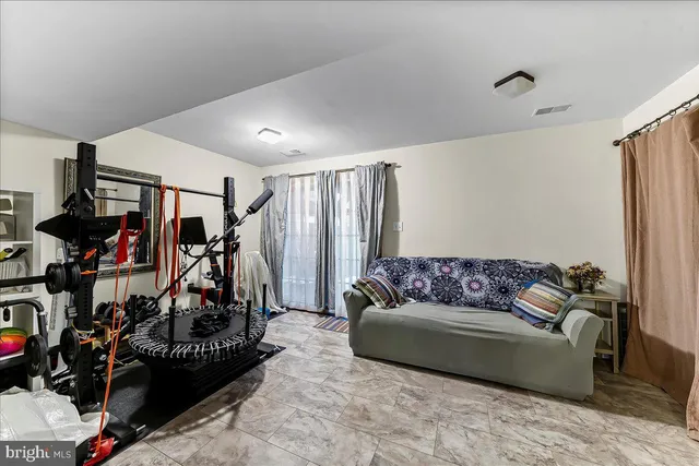 a bedroom with a bed and a cabinets