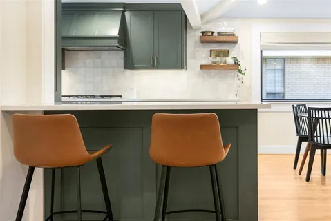 a kitchen with table and chair
