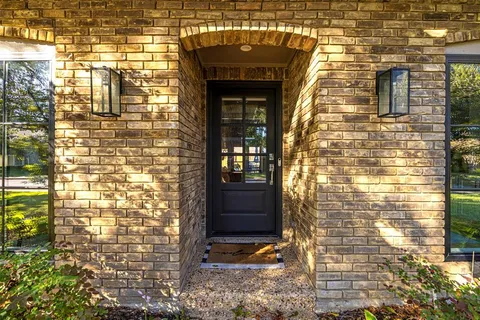 a front view of a brick house