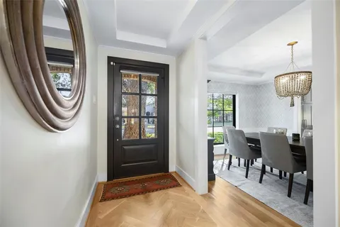 a view of a livingroom with furniture and windows