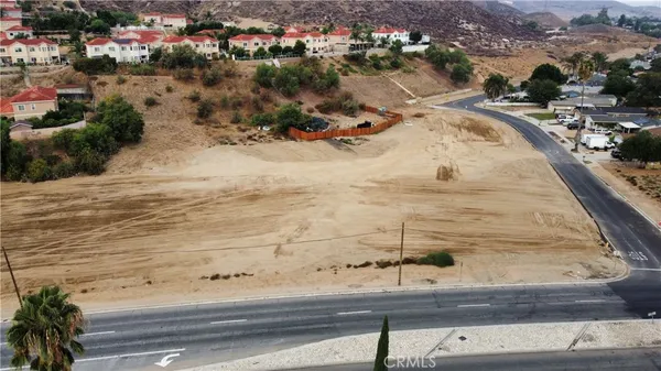 an aerial view of residential house and outdoor space