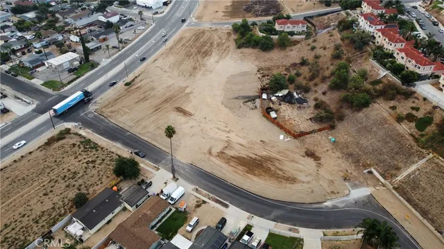 a vase of flowers sitting on a floor