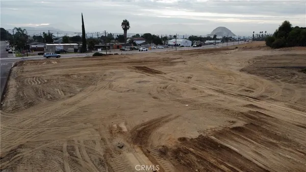 a view of a street with an ocean view