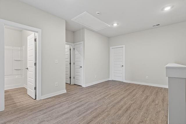 2534 Harbor Rdg Pass, Unit 344 Gainesville, GA 30507 - Photo 12 of 28 wooden floor in an empty room with a window