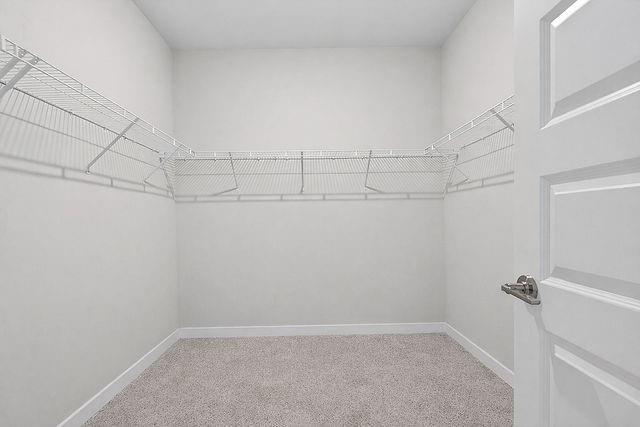 2534 Harbor Rdg Pass, Unit 344 Gainesville, GA 30507 - Photo 24 of 28 a view of a room with racks on the wall