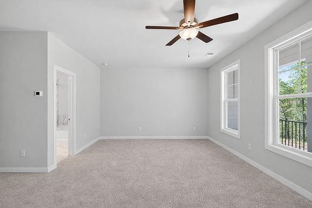 2534 Harbor Rdg Pass, Unit 344 Gainesville, GA 30507 - Photo 26 of 28 an empty room with windows and fan