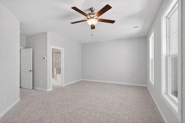 2534 Harbor Rdg Pass, Unit 344 Gainesville, GA 30507 - Photo 27 of 28 an empty room with closet and a ceiling fan